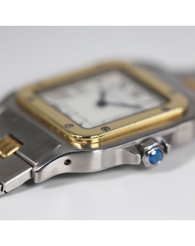 Montre Cartier Santos MM automatique acier et or jaune cadran argent bracelet acier et or jaune