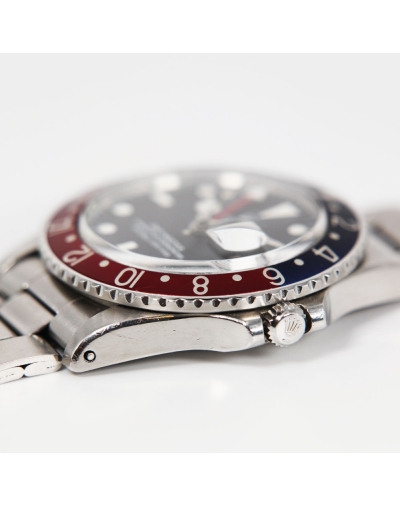 Rolex GMT Master 1675 "Long E" automatique acier lunette bleue et rouge cadran noir bracelet acier