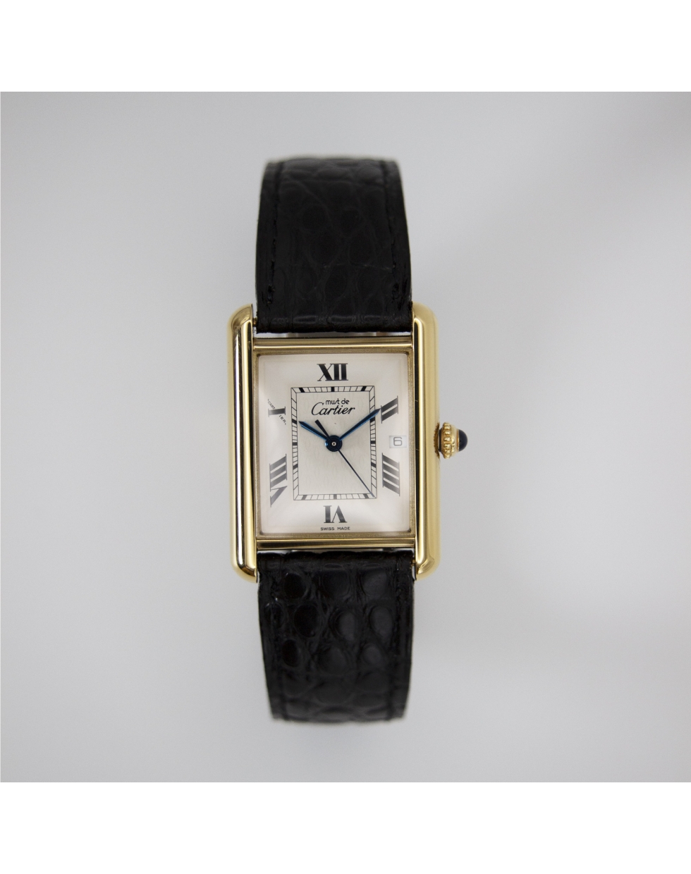 Montre Tank Must de Cartier, grand modèle, date